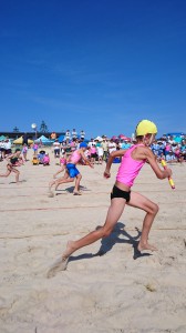 Harry Whitehouse in full stride in the beach sprint relay